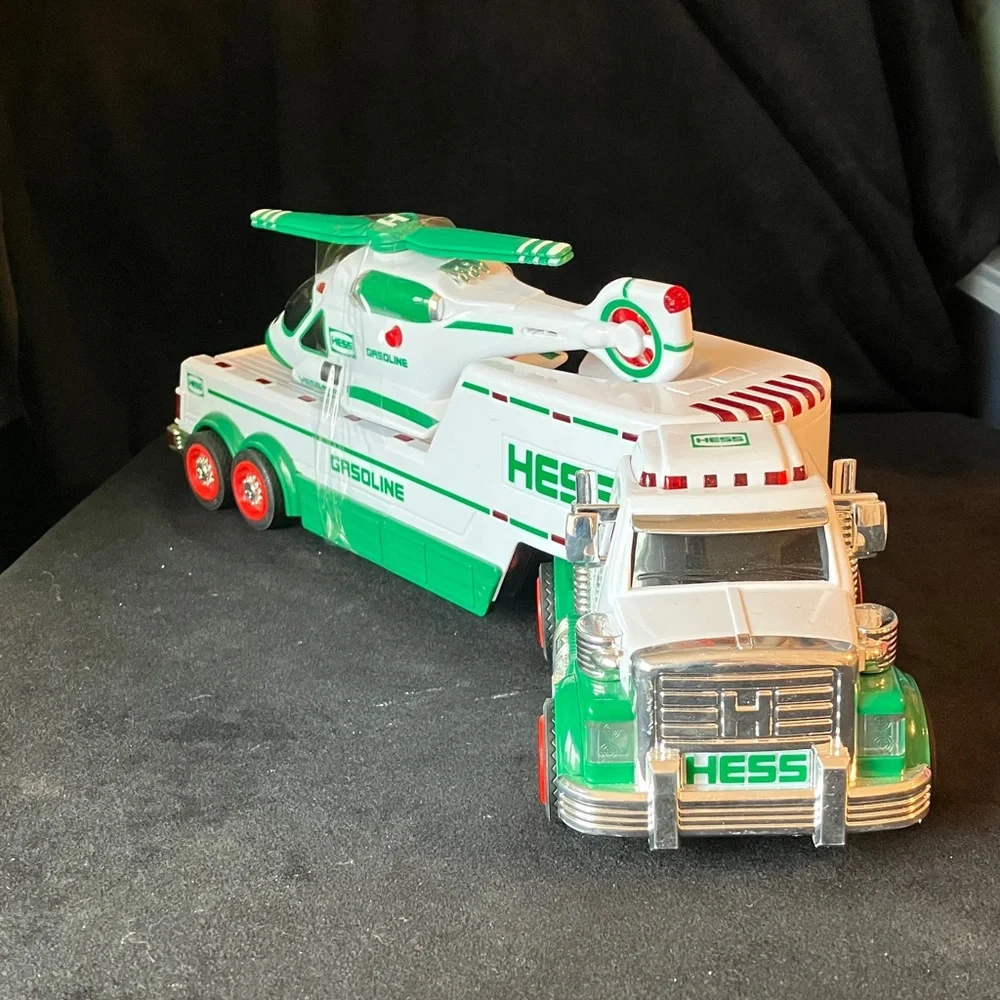 HESS Gasoline Semi Truck carrying helicopter Toy 2010 Toy plays sounds